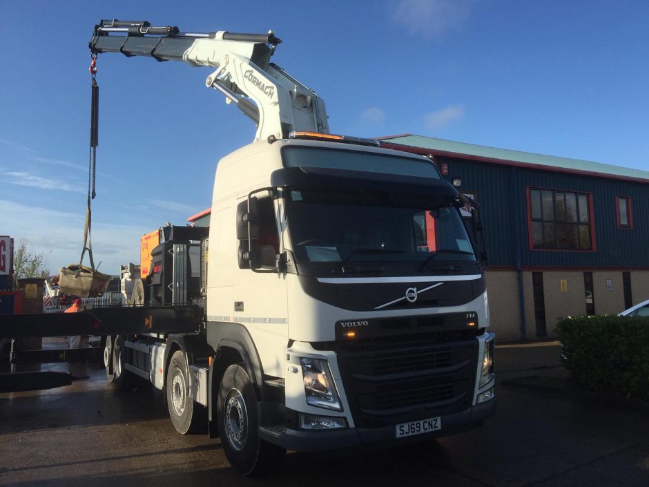 Colets extend transport division with addition of new Volvo FM12 with 52t/m crane on 8 x 4  chassis with rear steer fitted, plus drag unit.